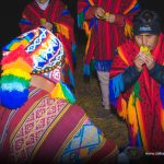 Man making an offering to Pachamama 