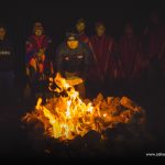 Man next to fire