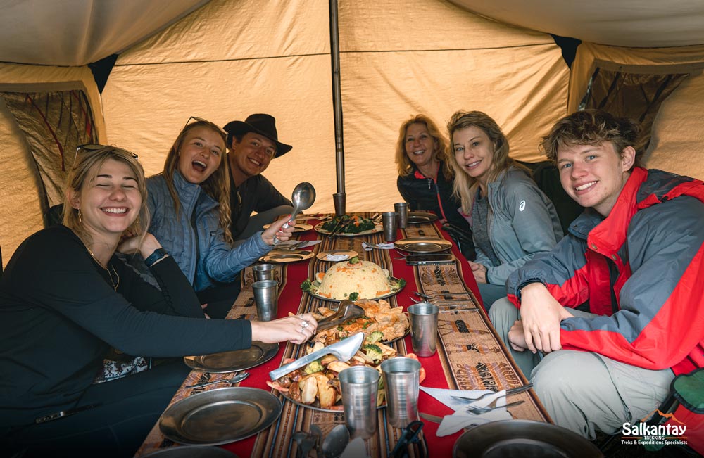 Tourists eating a delicious meal on the Inca Trail