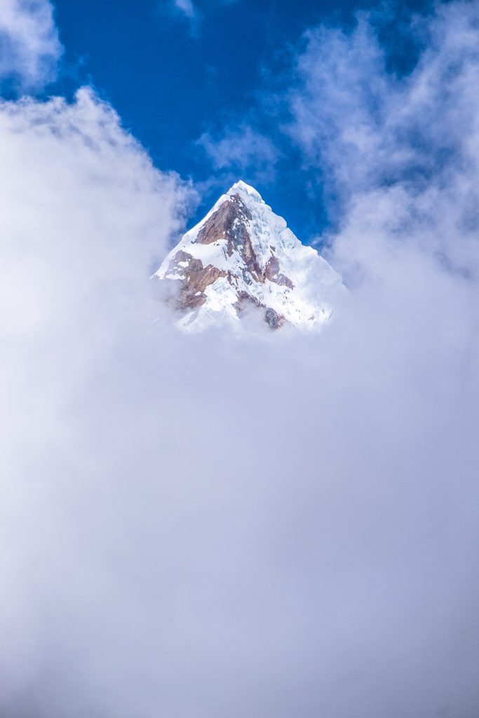 Mountain covered by clouds