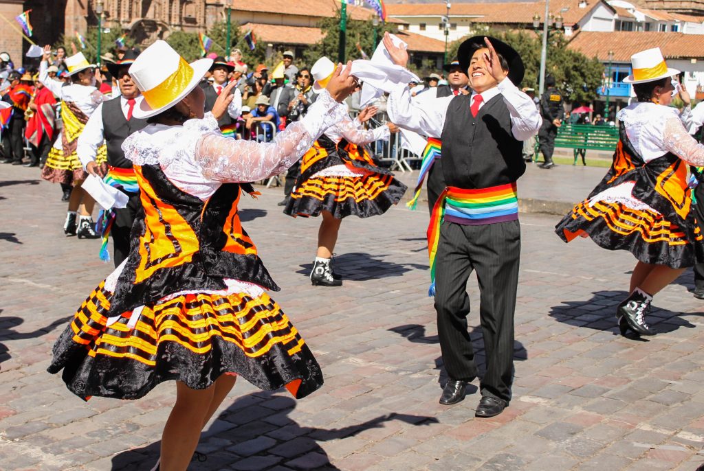 Couples bring happiness and elegance to Cuzco festivities.