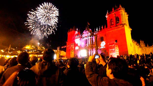 plaza-is-full-to-brim-people-fireworks-set-off-city