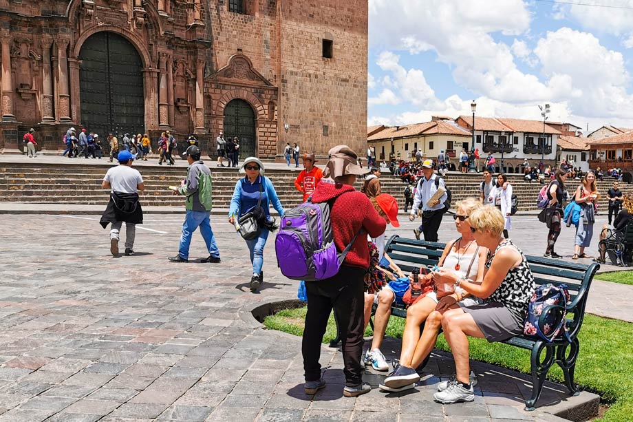 Sit on a Bench in the Plaza de Armas