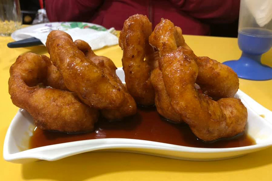 Picarones, little donuts made out of sweet potato