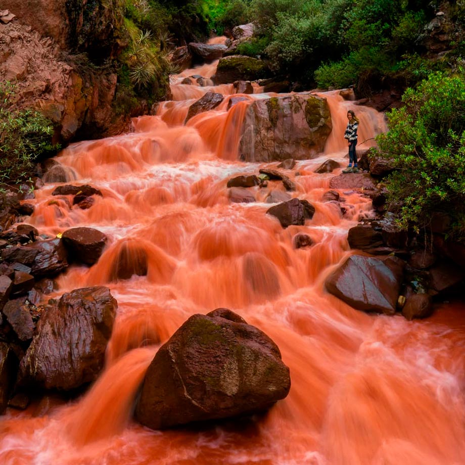Red waterfalls in the tour to the Palcoyo mountain 
