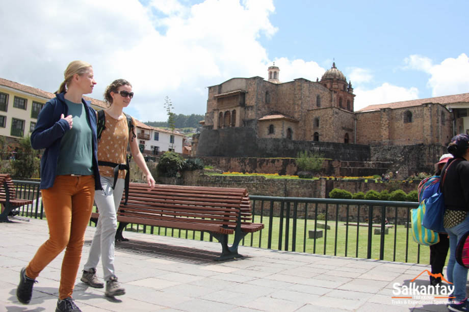Tourist walking next to Qoricancha site
