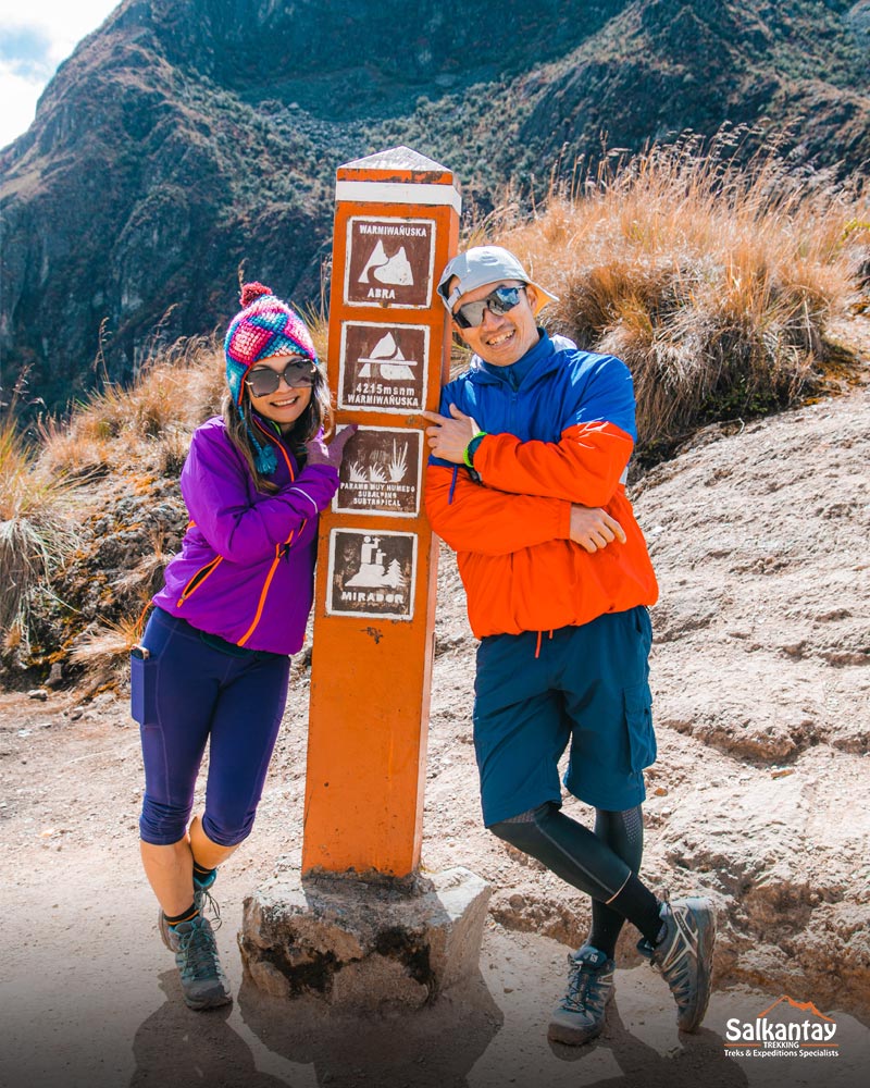 A tourist couple at the Dead Woman's Pass on the Inca Trail to Machu Picchu