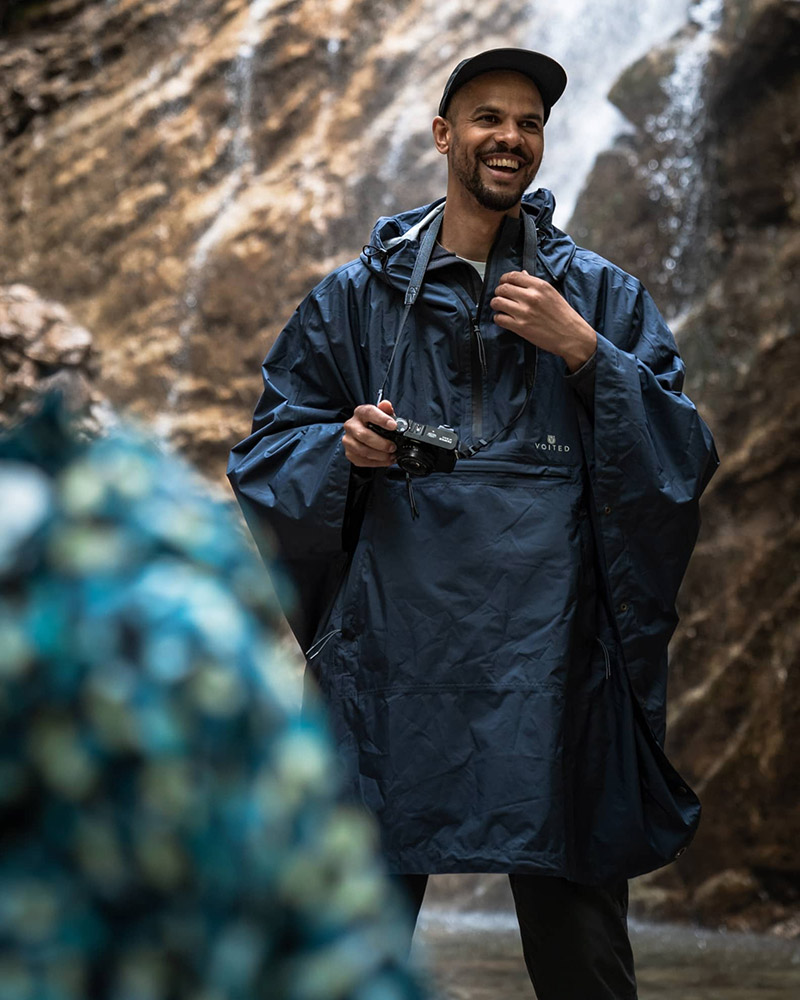 Man wearing a rain poncho