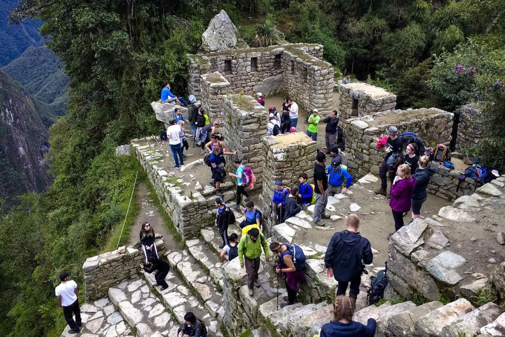 Inti Punku, Machu Picchu, crowded with tourists during peak season
