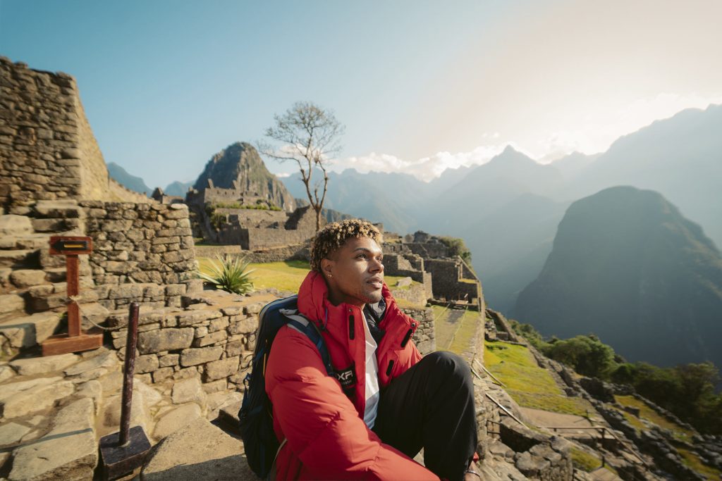 Tourist in the citadel of Machu Picchu