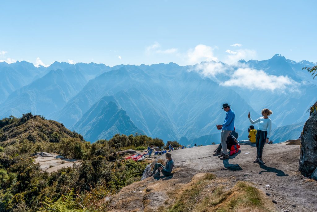 Tourists on the Inca Trail with the Andes mountains in the background