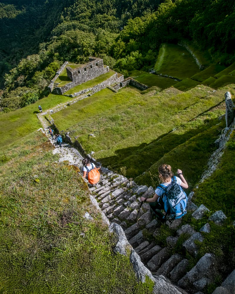 Tourists on the steps along the Inca Trail