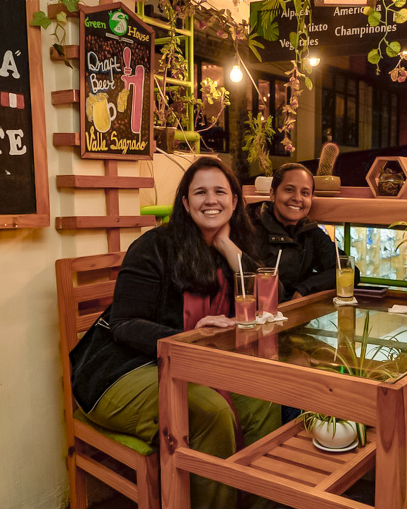 Two people eating at the Green House Restaurant