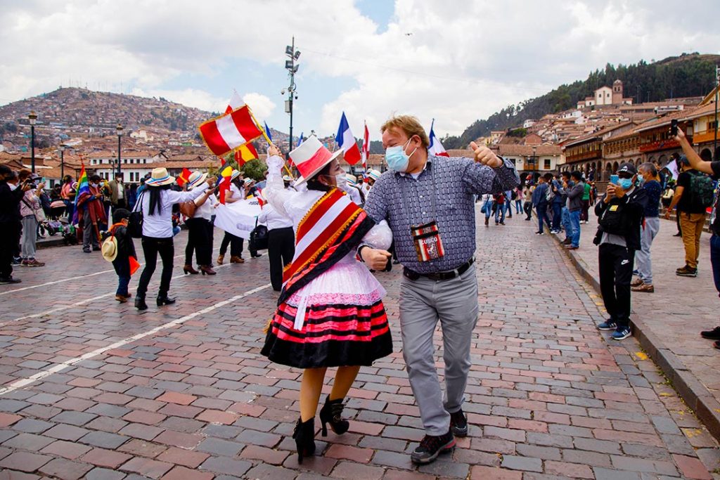 dancing with tourists in cusco