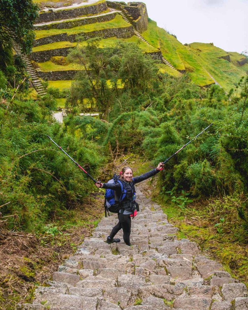 Beautiful girl trekking the Inca Trail route happy every stunning lanscapes is beautiful