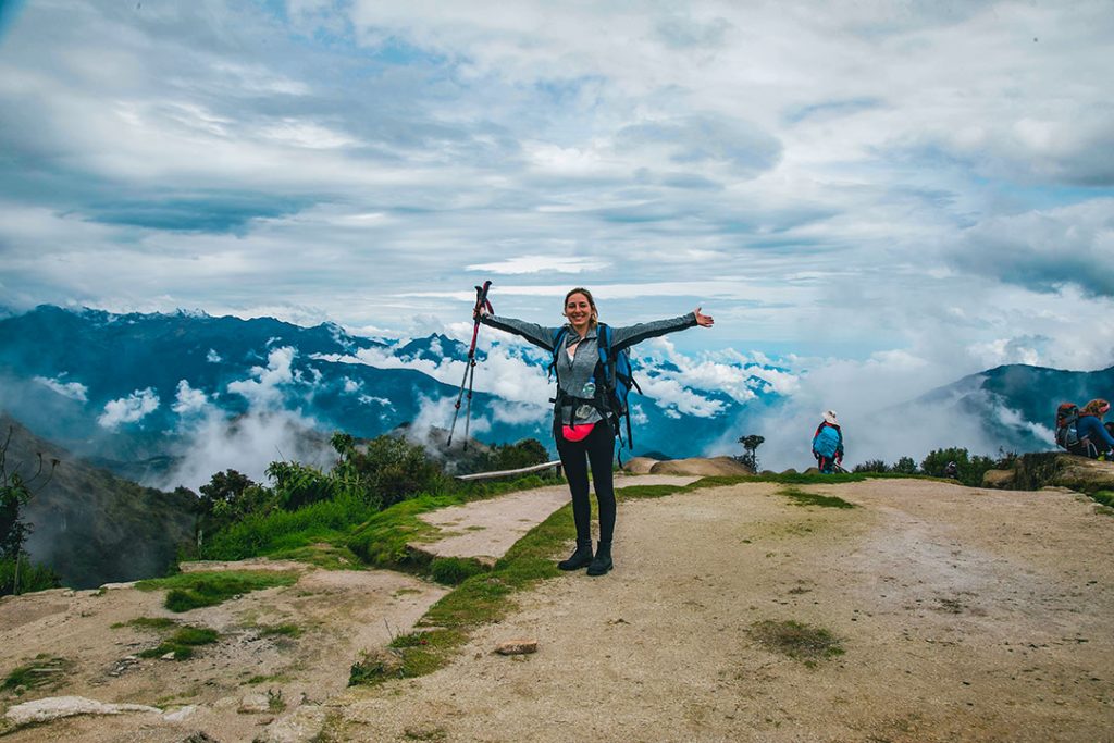 Beautiful girl happy Inca Trail Cusco-peru best trekking trails south america