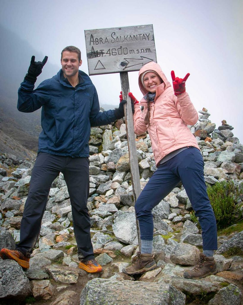 Couple trekking the Salkantay trek salkantay pass on of the best treks in south america