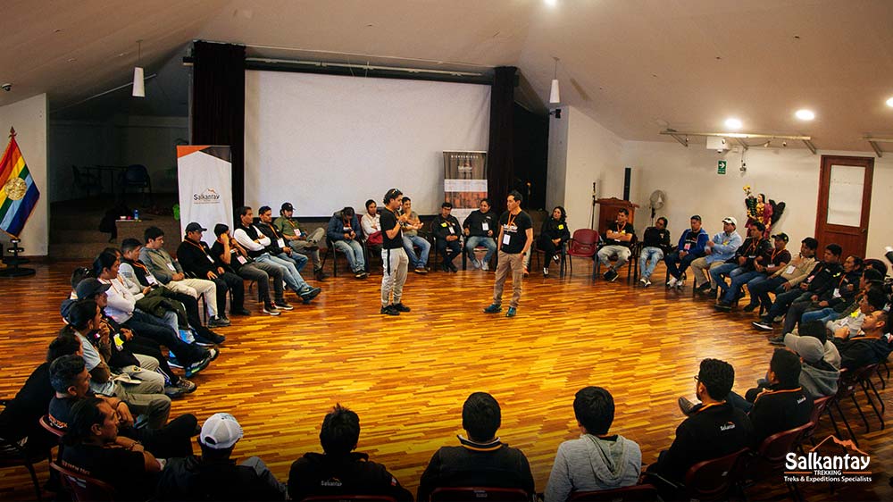Photo of the Salkantay Trekking team of guides during a talk and training.
