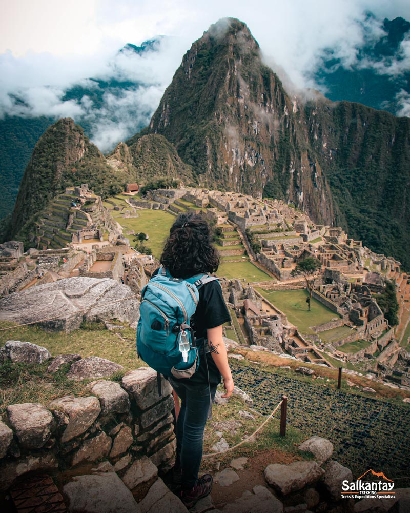 Female tourist viewing Machu Picchu