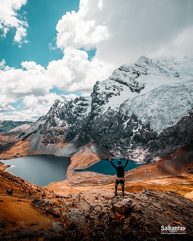 Tourist in front of Ausangate mountain in Peru