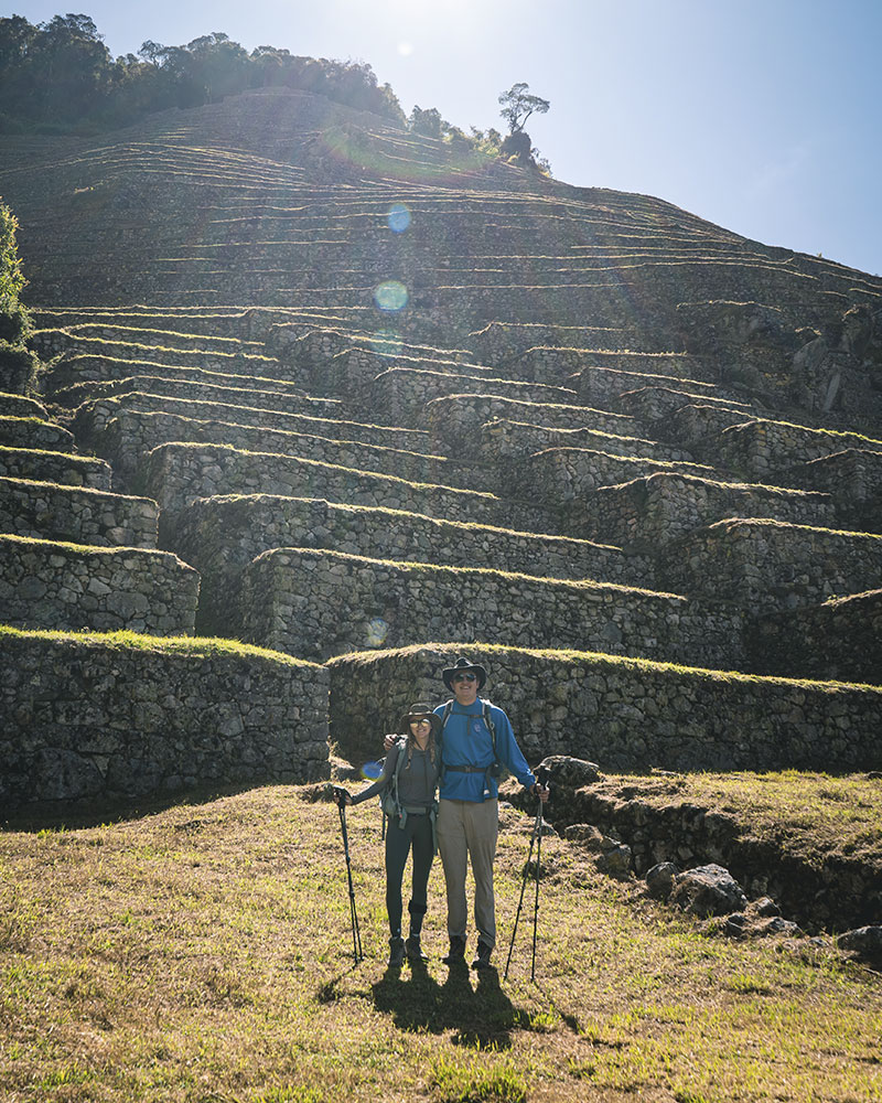 Tourists posing at Wiñay Wayna on the Inca Trail