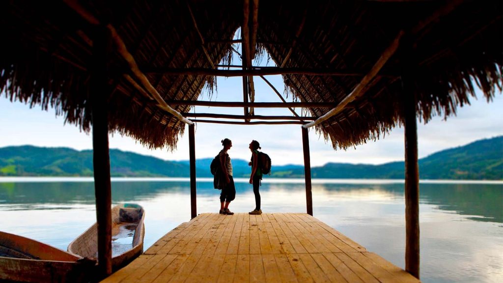 COUPLE CONVERSING ON THE DOCK - BLUE LAGOON, SAN MARTÍN