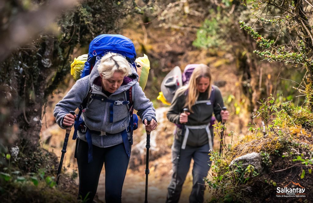 Image of a women with all the trekking gear