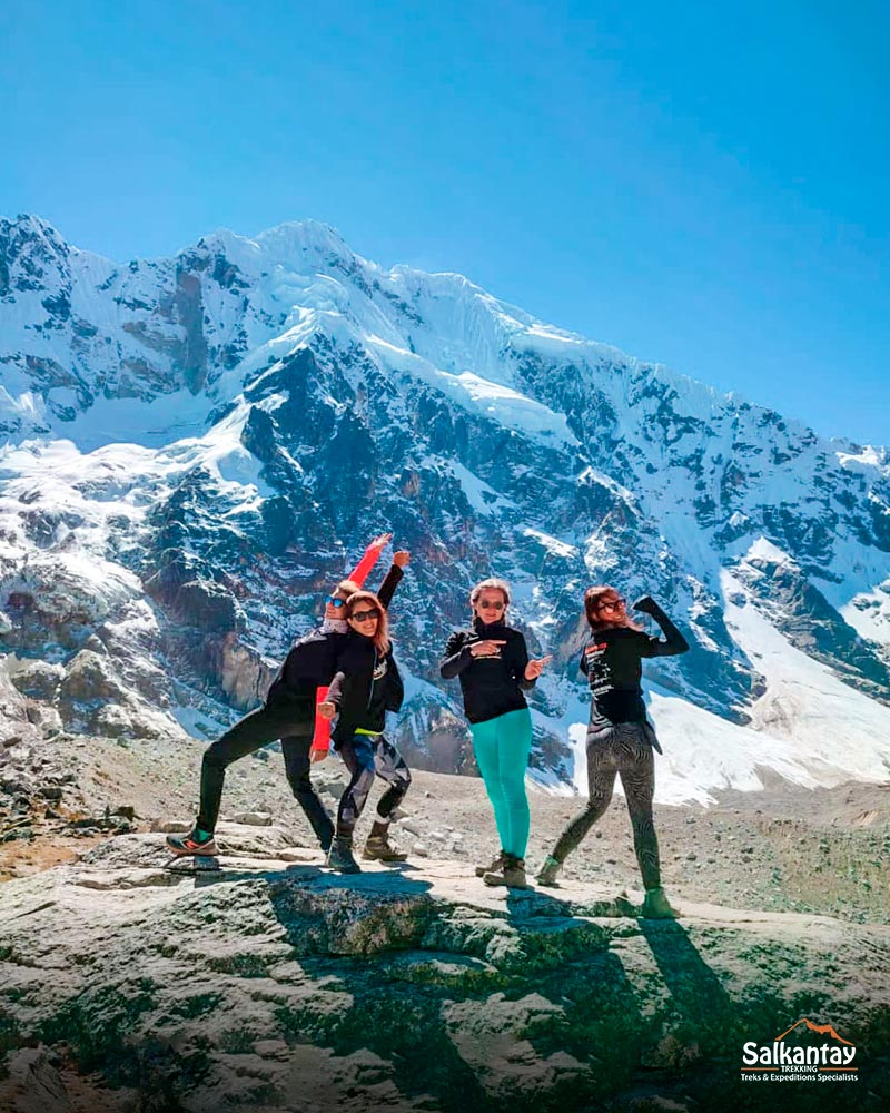 Happy tourists in the Salkantay Pass