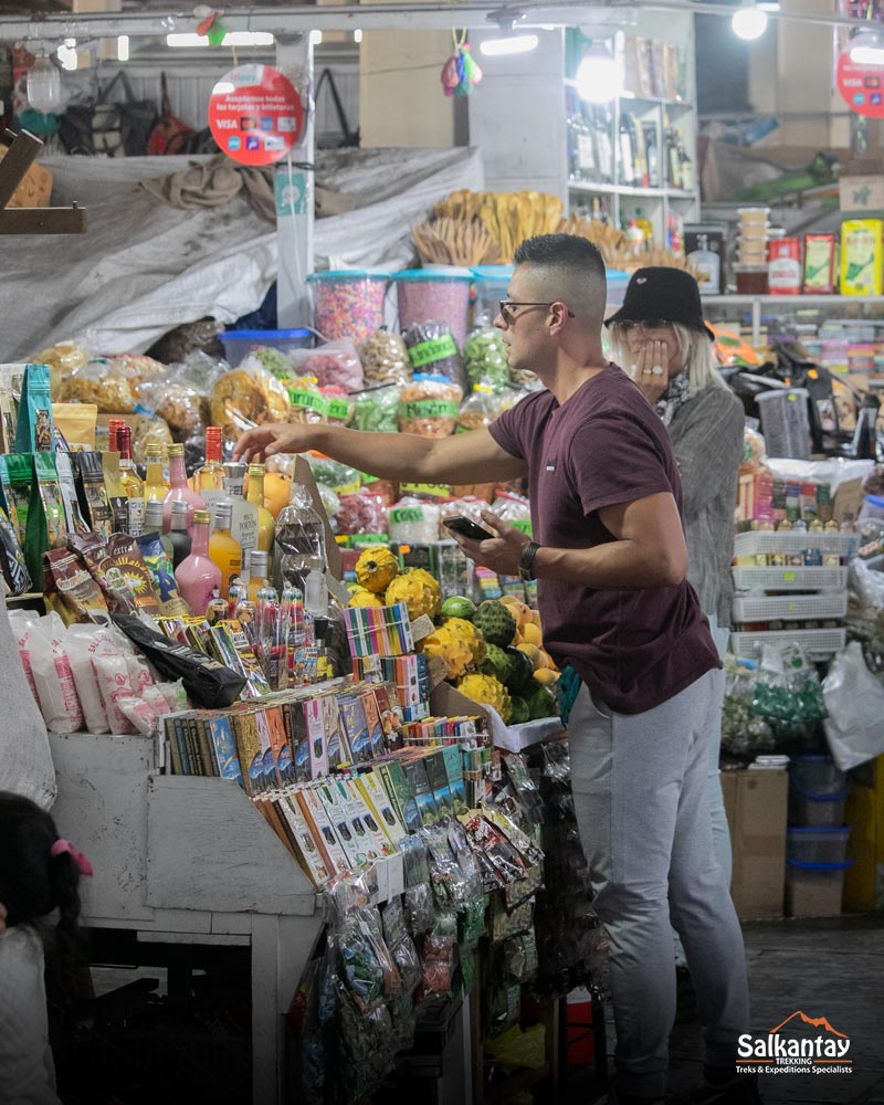 Tourist at the central market of San Pedro in Cusco