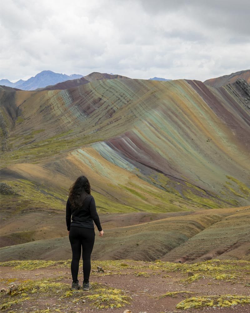 Tourist standing looking at the Colored Mountain of Palccoyo