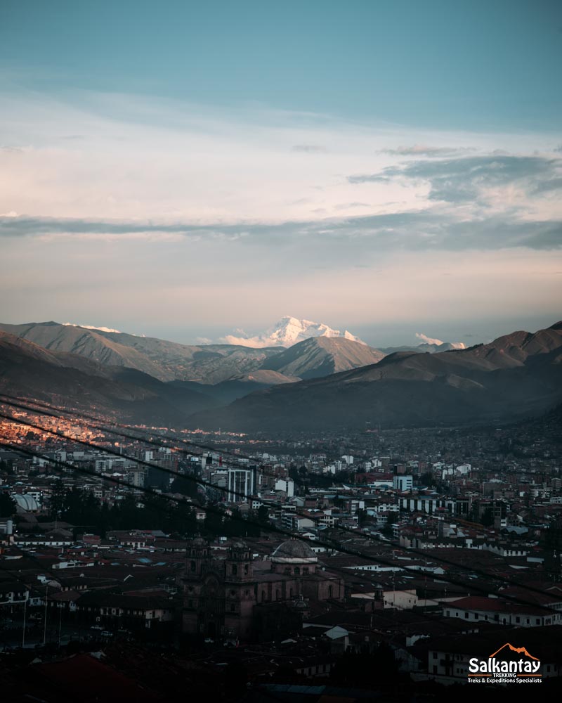 Panoramic view of Cusco the city of the Incas with the backdrop of the sacred mountain of Ausangate.