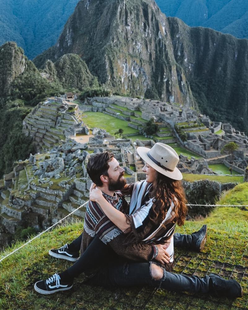A couple enjoying themselves at Machu Picchu