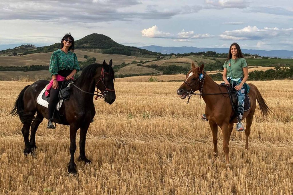 Two tourists going for a horseback ride in Cusco
