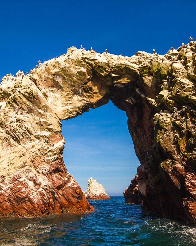 Natural arch on the Ballestas Islands in Paracas