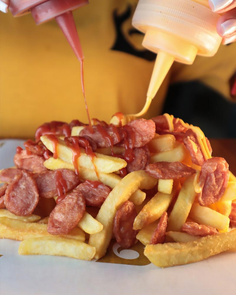 Salchipapa | Photo by @brioburguer