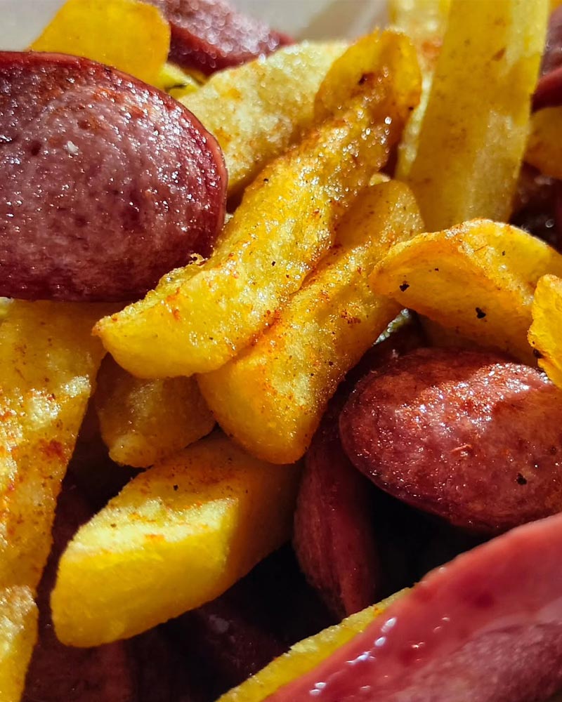 Salchipapas | Photo by @gaffaspizza