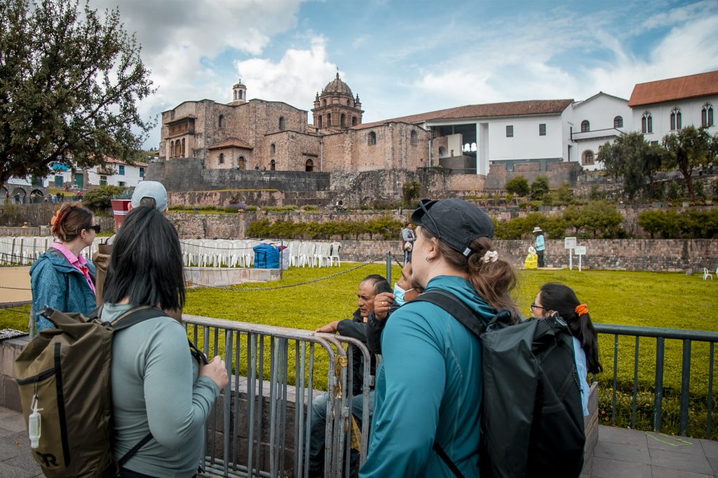 Tourists viewing the sun temple of Qorikancha