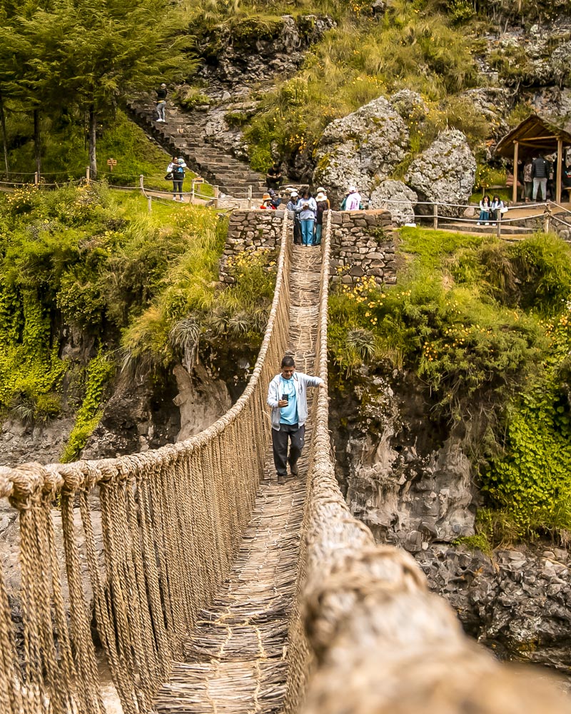 Tourists crossing the bridge of Q'eswachaka