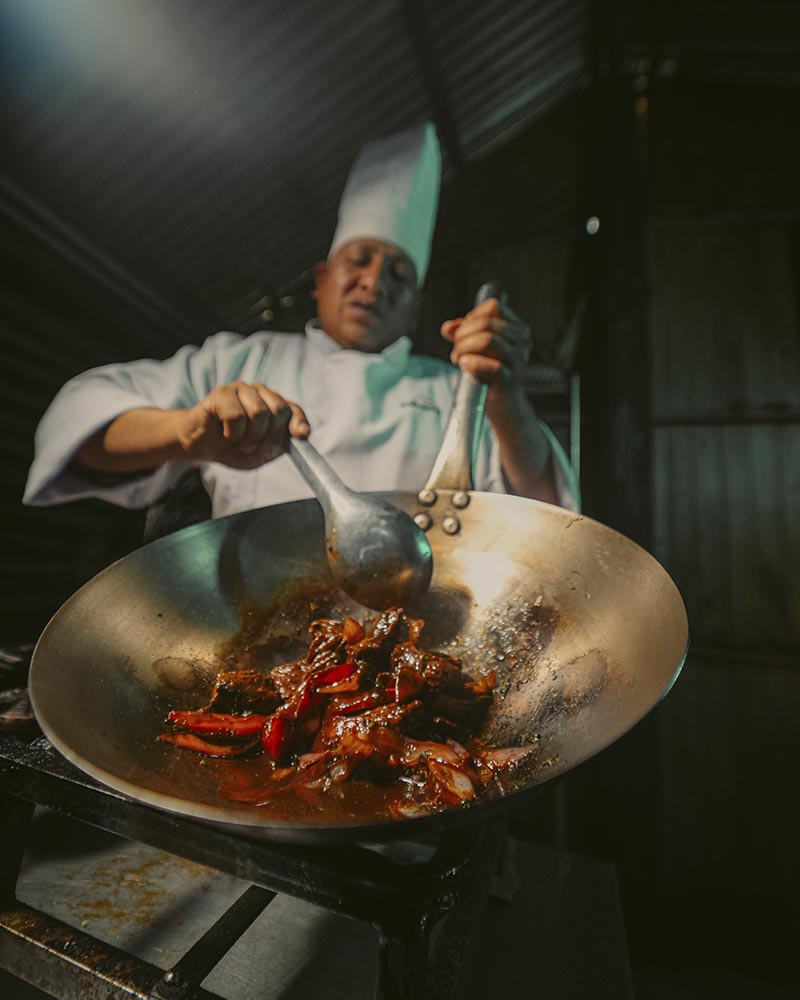 Our cook preparing a meal on the route