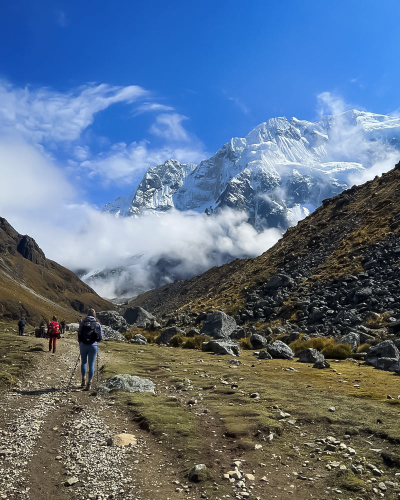 Tourist walking towards Apu Salkantay.