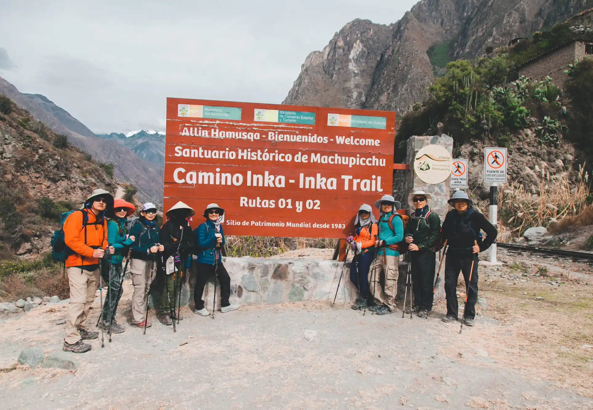 Group of tourists at the start of the Classic Inca Trail Km82