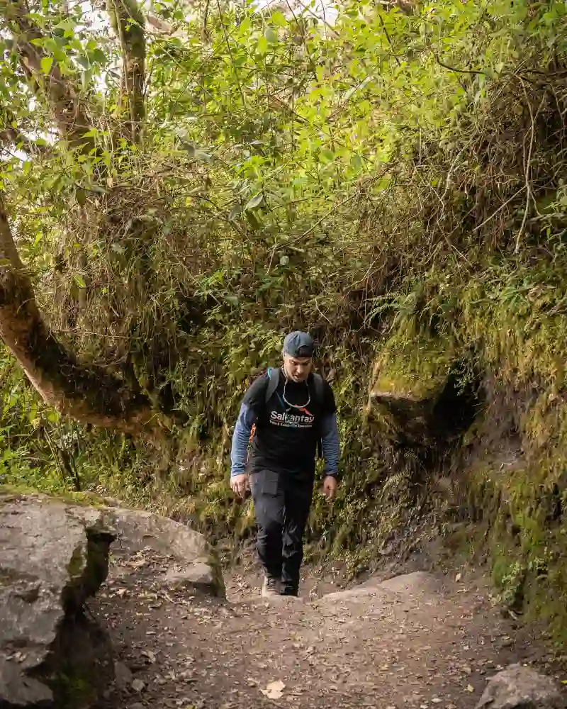 Tourist hiking the Inca Trail to Machu Picchu during the dry season
