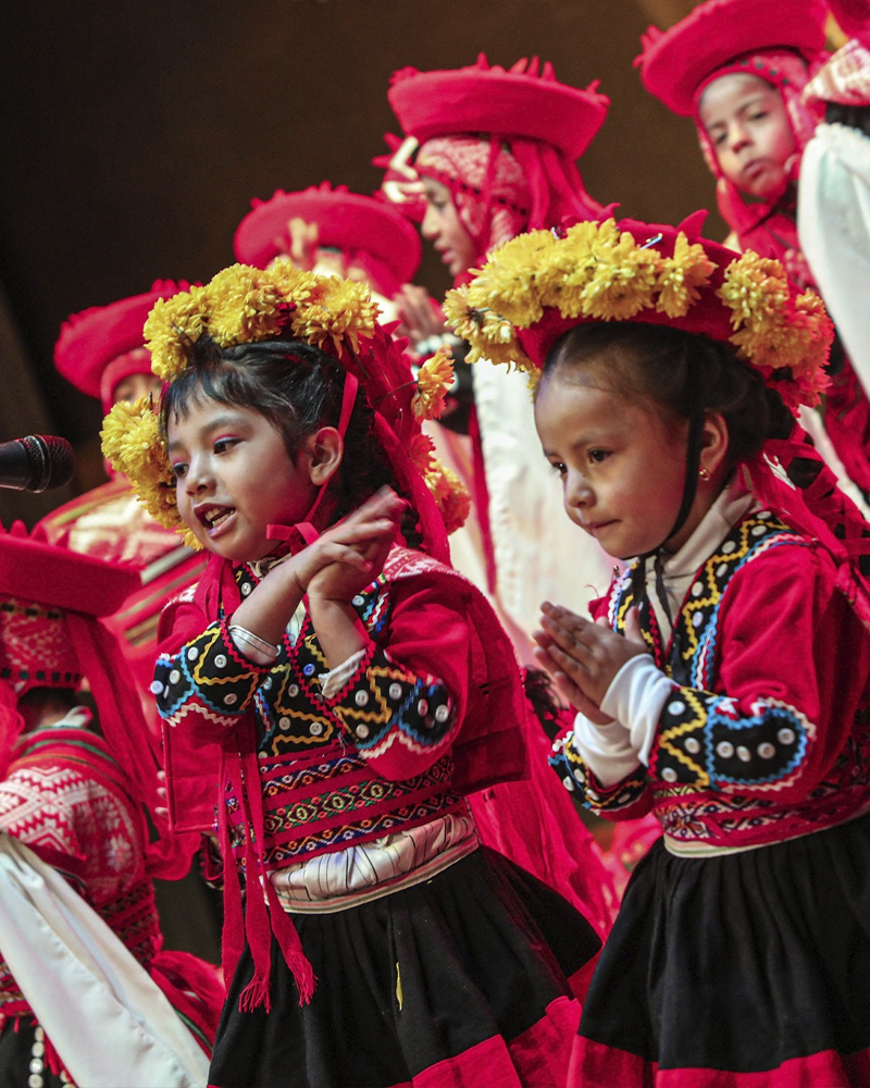 Girls singing Christmas Carols in Cusco