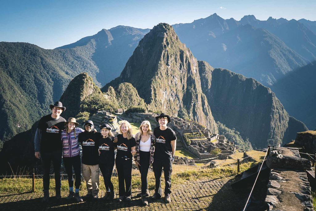 Tourists take photos at Machu Picchu.