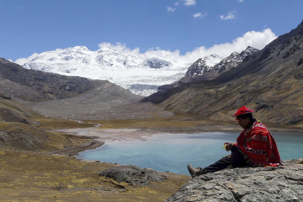 Ocongate resident eating a tangerine near Mountain Ausangate