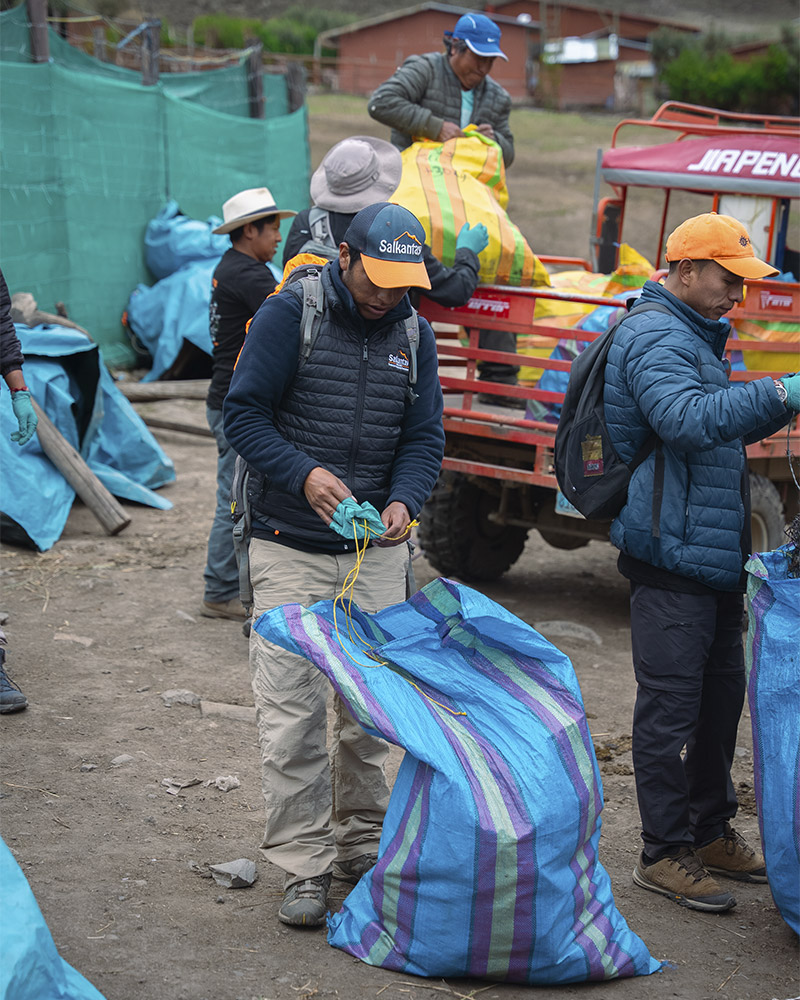 Participants in the cleanup campaign finishing waste sorting at the foot of Mount Humantay.