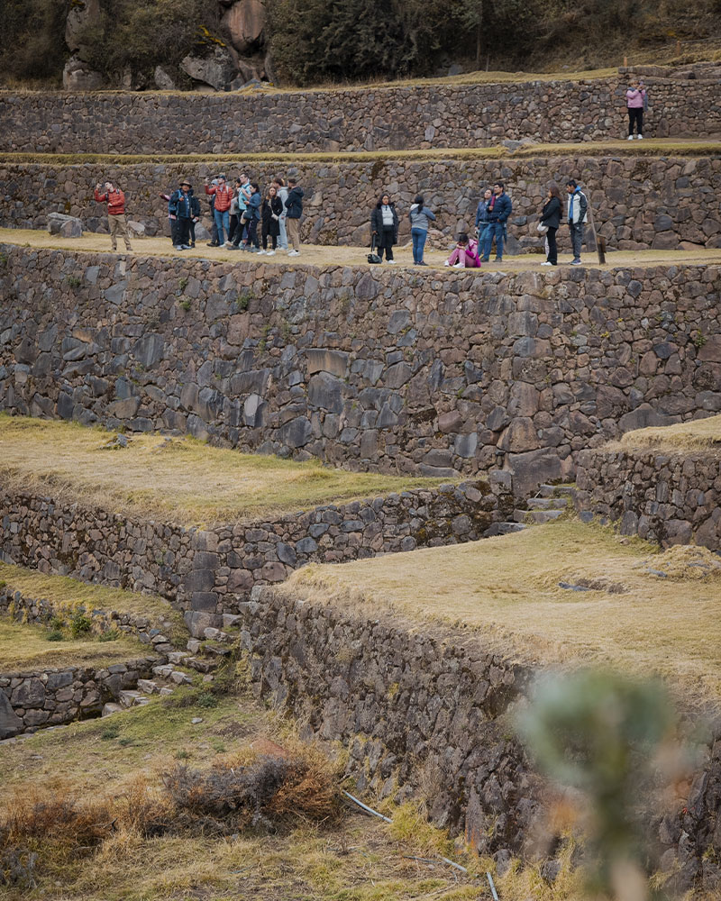 People at the archaeological site of Pisac, Sacred Valley, Cusco