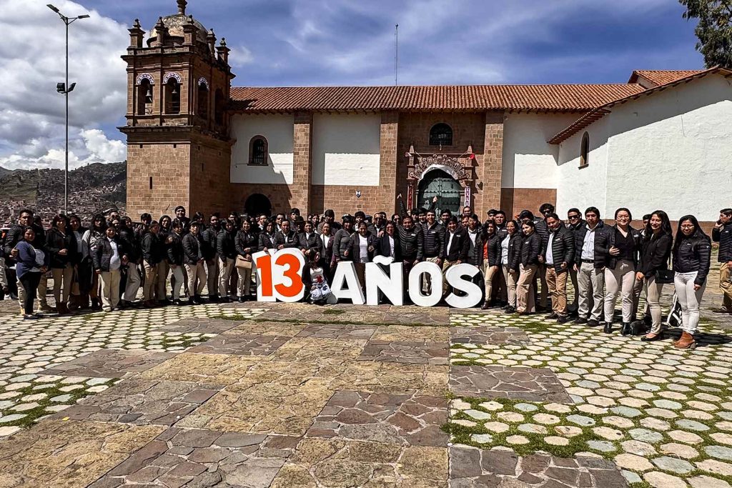 Salkantay trekking team at a commemorative Mass for its 13th anniversary