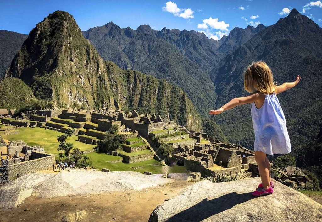 Girl in Machu Picchu on a sunny day