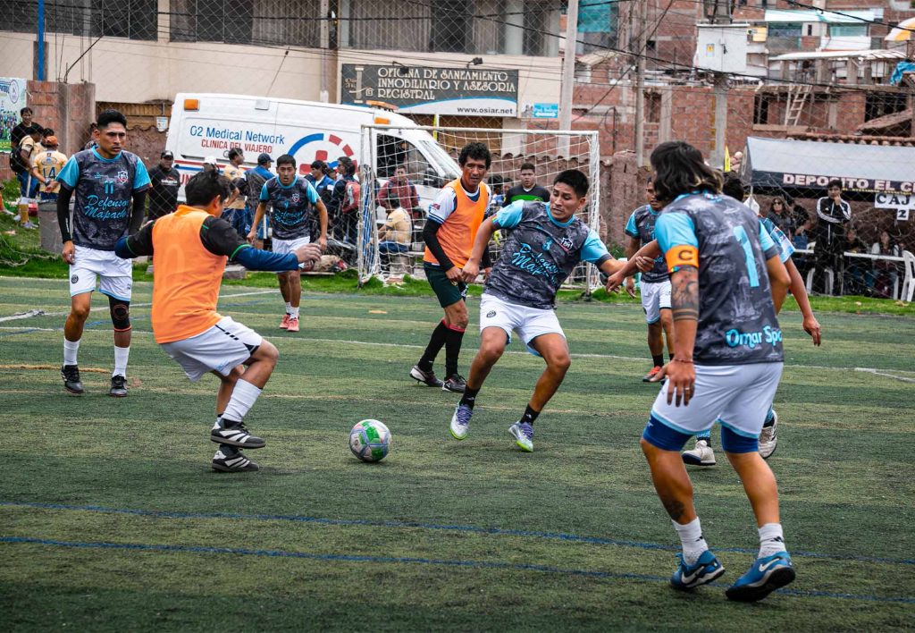 People playing soccer in the Salkantay Cup Sports Championship, organized by Salkantay Trekking